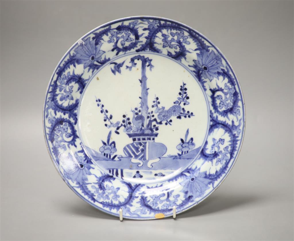 An 18th century Japanese Arita blue and white plate, spurs marks, diameter 26cm